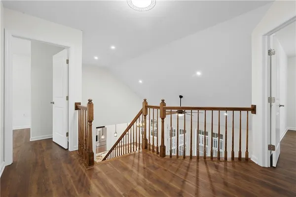 a view of entryway with wooden floor