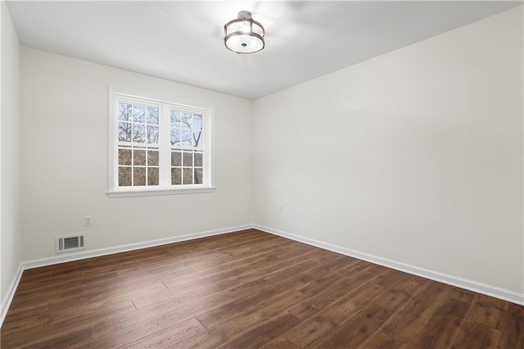 5149 Watters Road Lower Burrell, PA 15068 - Photo 28 of 49 a view of a room with wooden floor and windows
