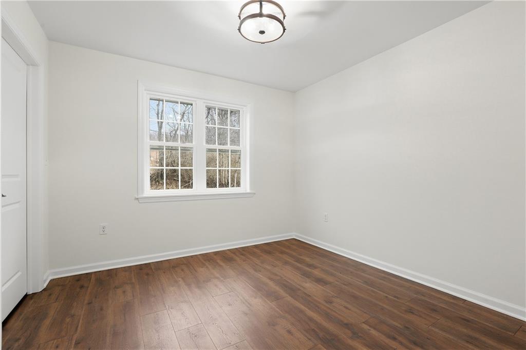 5149 Watters Road Lower Burrell, PA 15068 - Photo 29 of 49 an empty room with wooden floor and windows