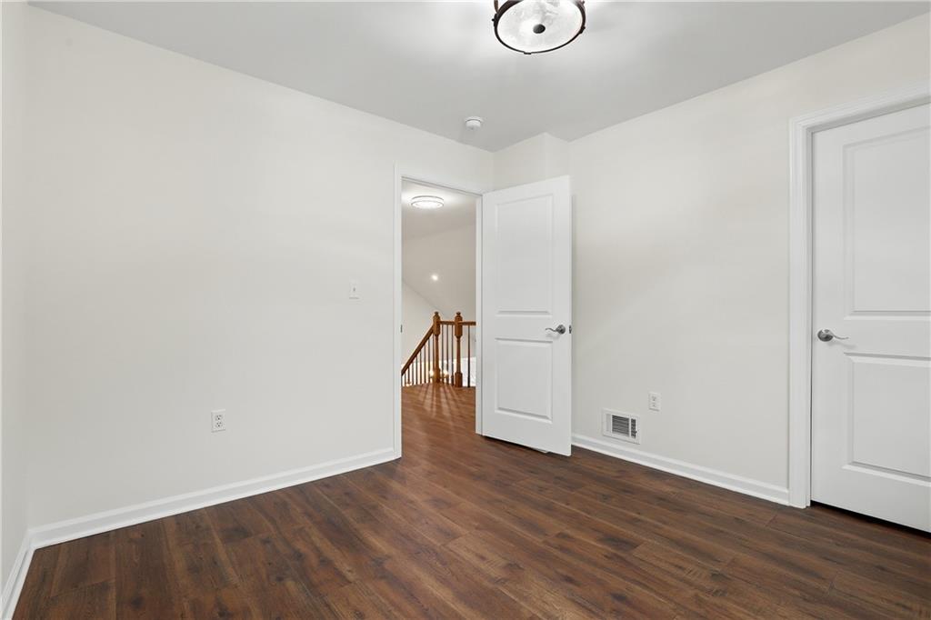 5149 Watters Road Lower Burrell, PA 15068 - Photo 30 of 49 a view of empty room with wooden floor