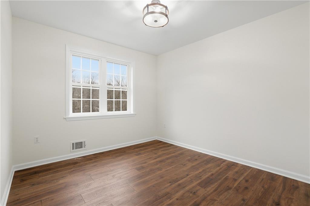5149 Watters Road Lower Burrell, PA 15068 - Photo 33 of 49 a view of a room with wooden floor and windows