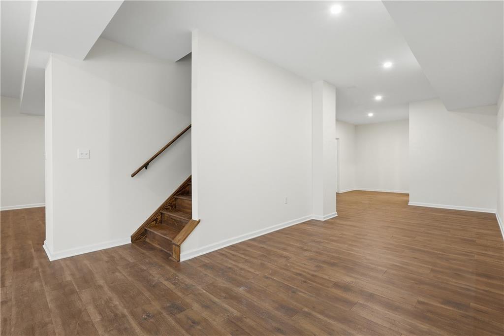 5149 Watters Road Lower Burrell, PA 15068 - Photo 35 of 49 a view of an empty room with wooden floor and stairs