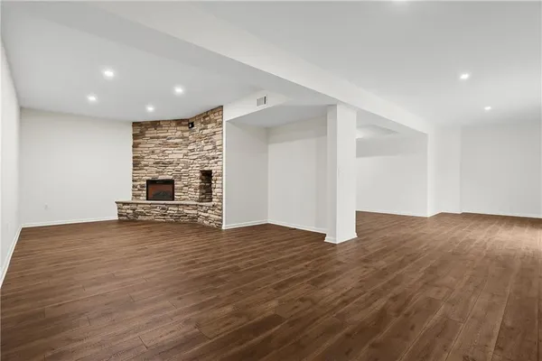 a view of kitchen with microwave and hardwood floor