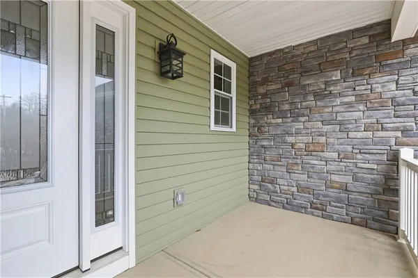 a view of outdoor space and front door