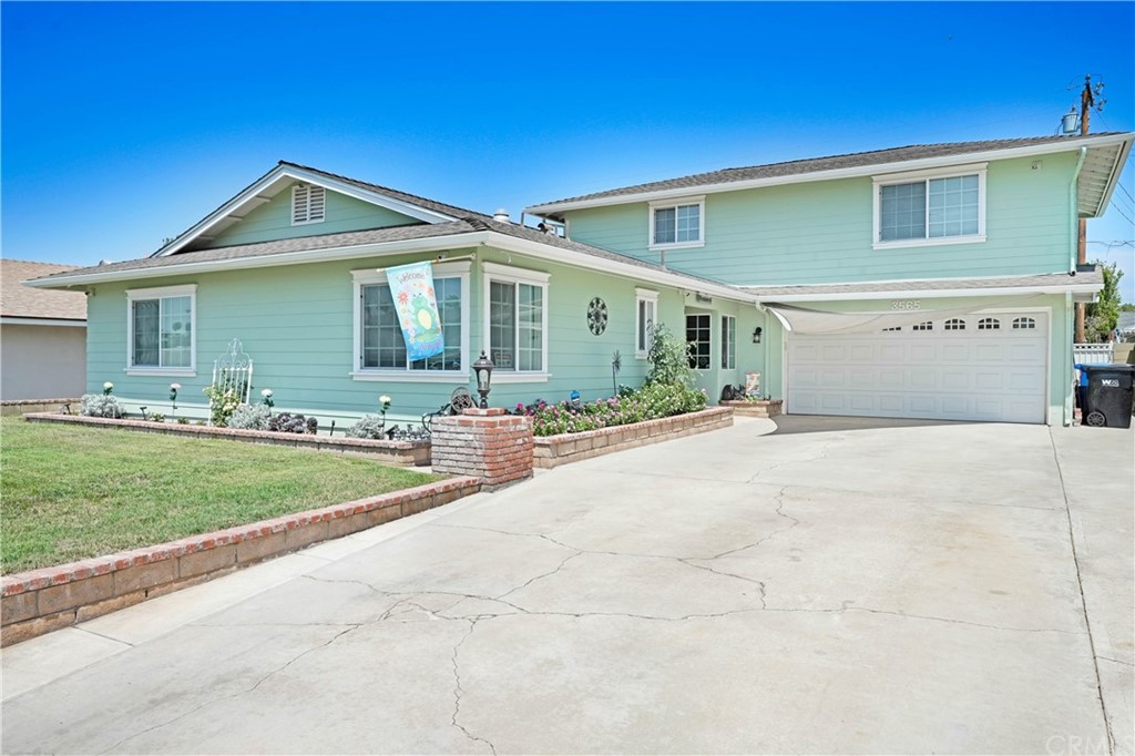 3565 Mapleleaf Drive Riverside, CA 92503 - Photo 1 of 1 a view of a yard in front of a house