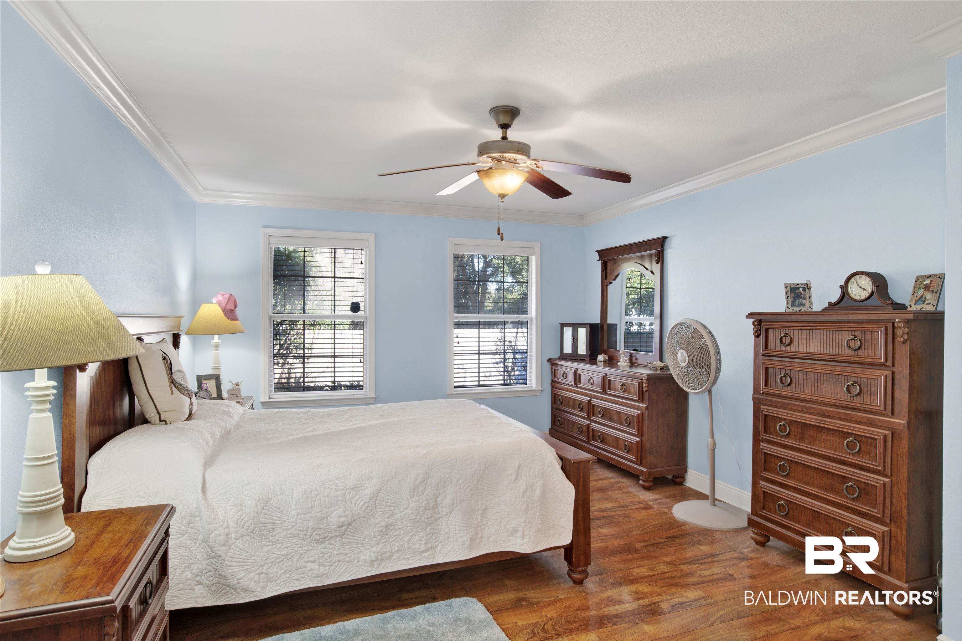 314 Blackfriars Street Fairhope, AL 36532 - Photo 17 of 25 Bedroom featuring multiple windows, ornamental molding, dark wood-type flooring, and ceiling fan