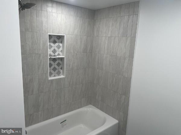 9906 Bustleton Avenue, Unit F3 Philadelphia, PA 19115 - Photo 3 of 8 a bathroom with a bathtub and shower