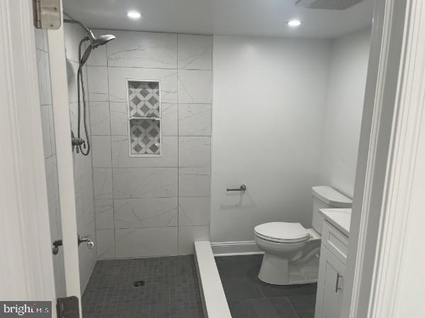 9906 Bustleton Avenue, Unit F3 Philadelphia, PA 19115 - Photo 4 of 8 a bathroom with a toilet and a shower