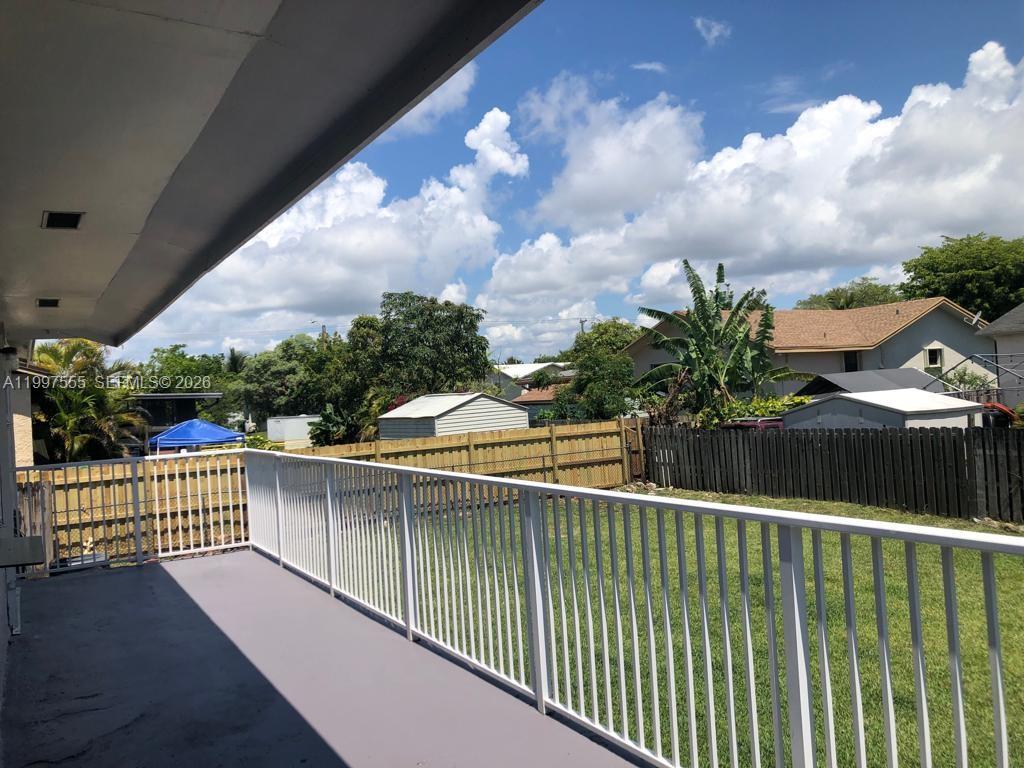 9771 Southwest 211 Street Cutler Bay, FL 33189 - Photo 4 of 19 a view of balcony and yard
