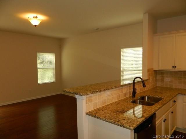 1532 Spring Blossom Trail, Unit SITE 41 Fort Mill, SC 29708 - Photo 7 of 20 a kitchen with a sink and a window