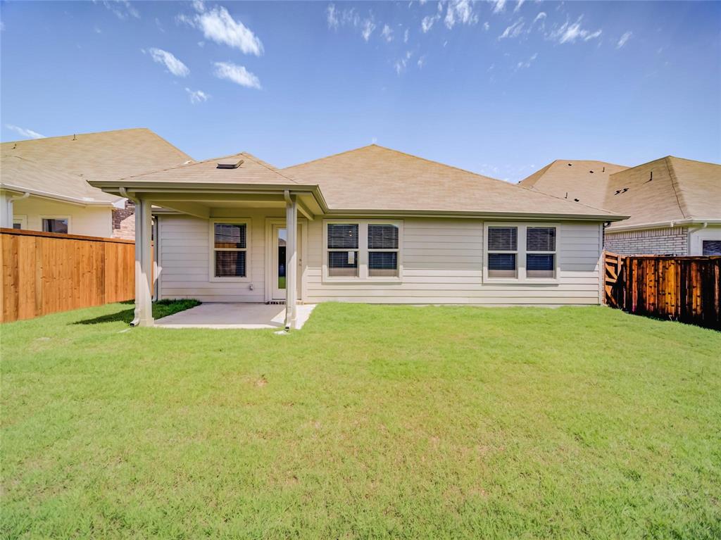 3405 Kingsgarden Road Denton, TX 76207 - Photo 28 of 37 a front view of a house with garden