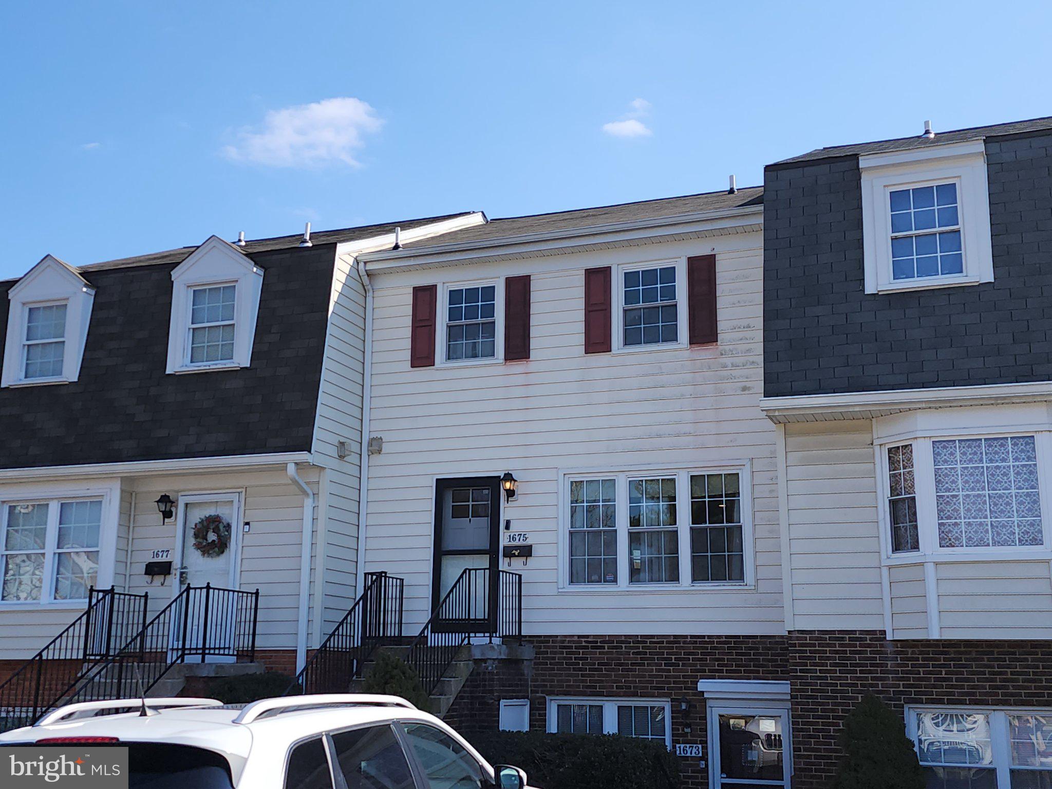 1675 Ridgely Court, Unit 182 Crofton, MD 21114 - Photo 2 of 47 a front view of a building with glass windows