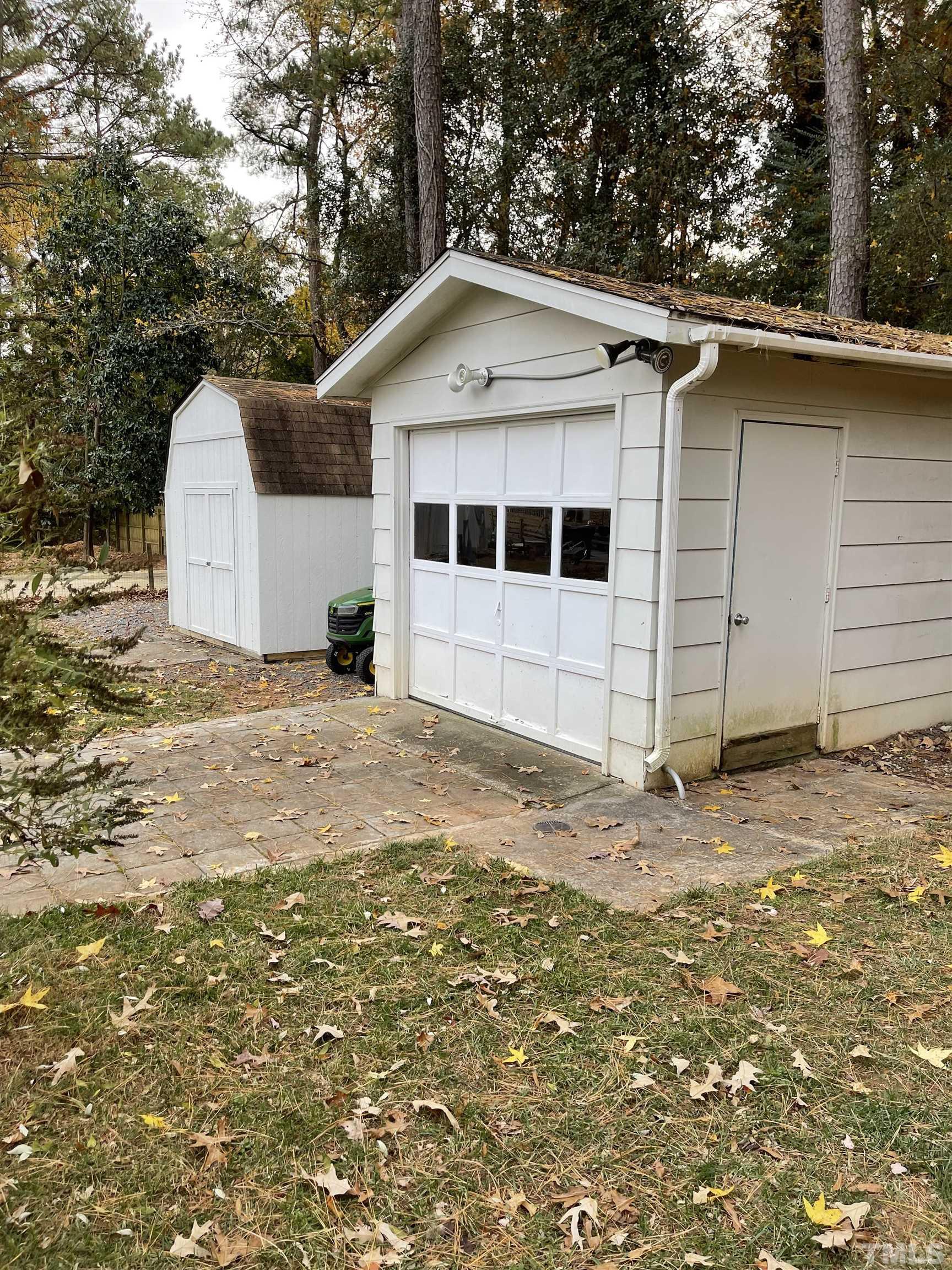 7701 Leesville Road Raleigh, NC 27613 - Photo 3 of 33 a house with a outdoor space