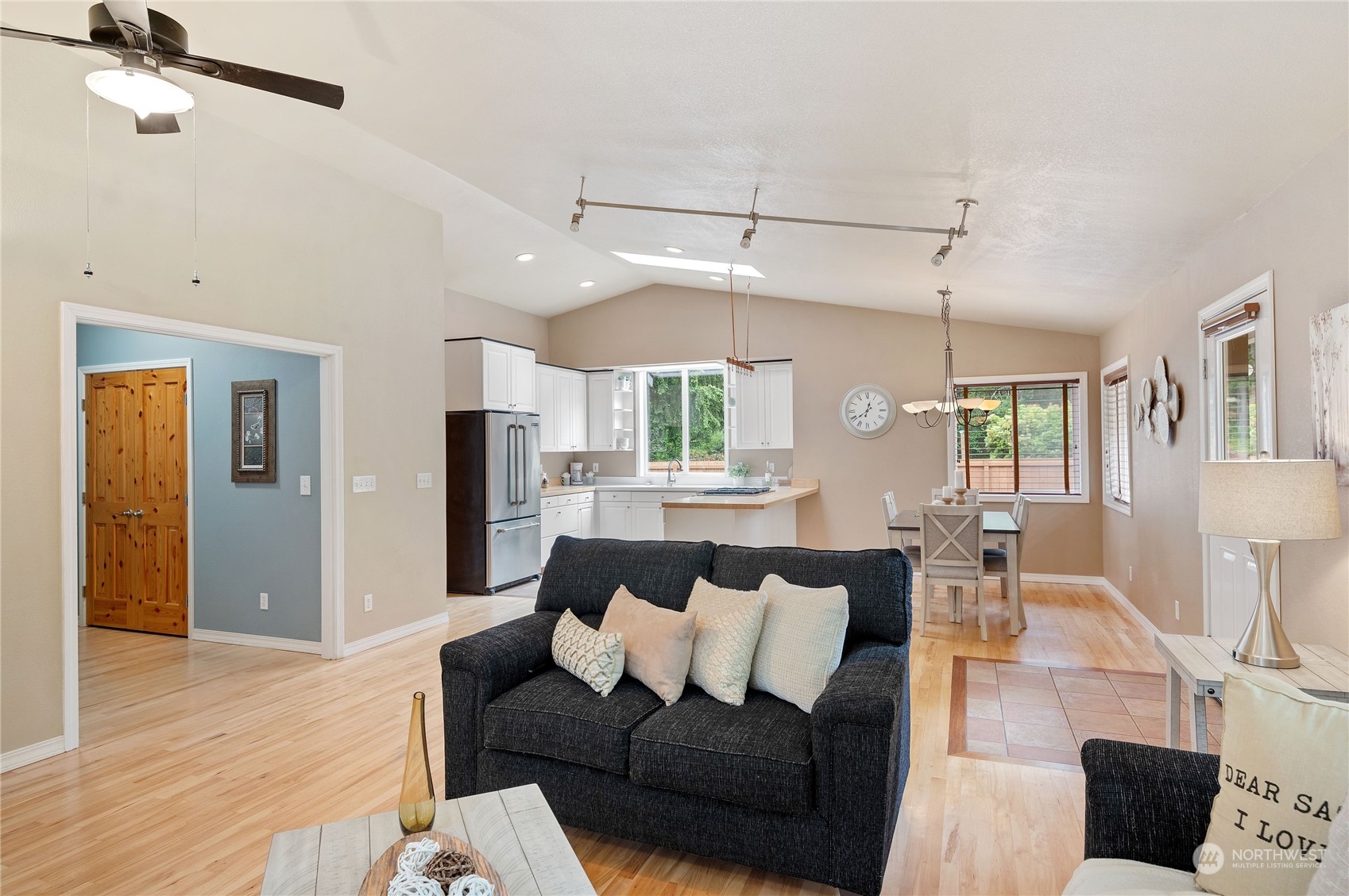 3860 Northeast Iverson Road Poulsbo, WA 98370 - Photo 11 of 40 a living room with furniture and wooden floor
