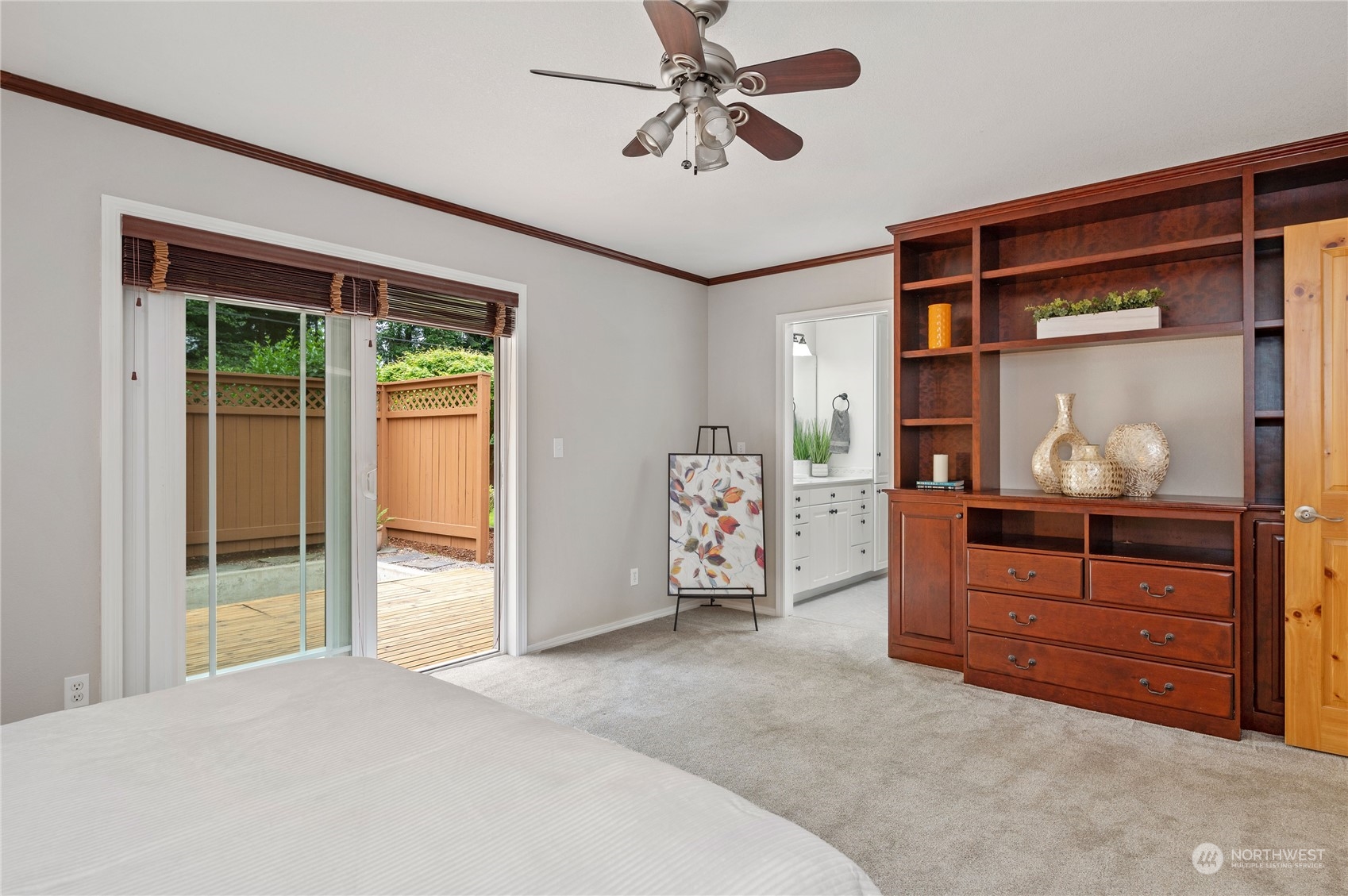 3860 Northeast Iverson Road Poulsbo, WA 98370 - Photo 22 of 40 a bed room with a bed and a mirror