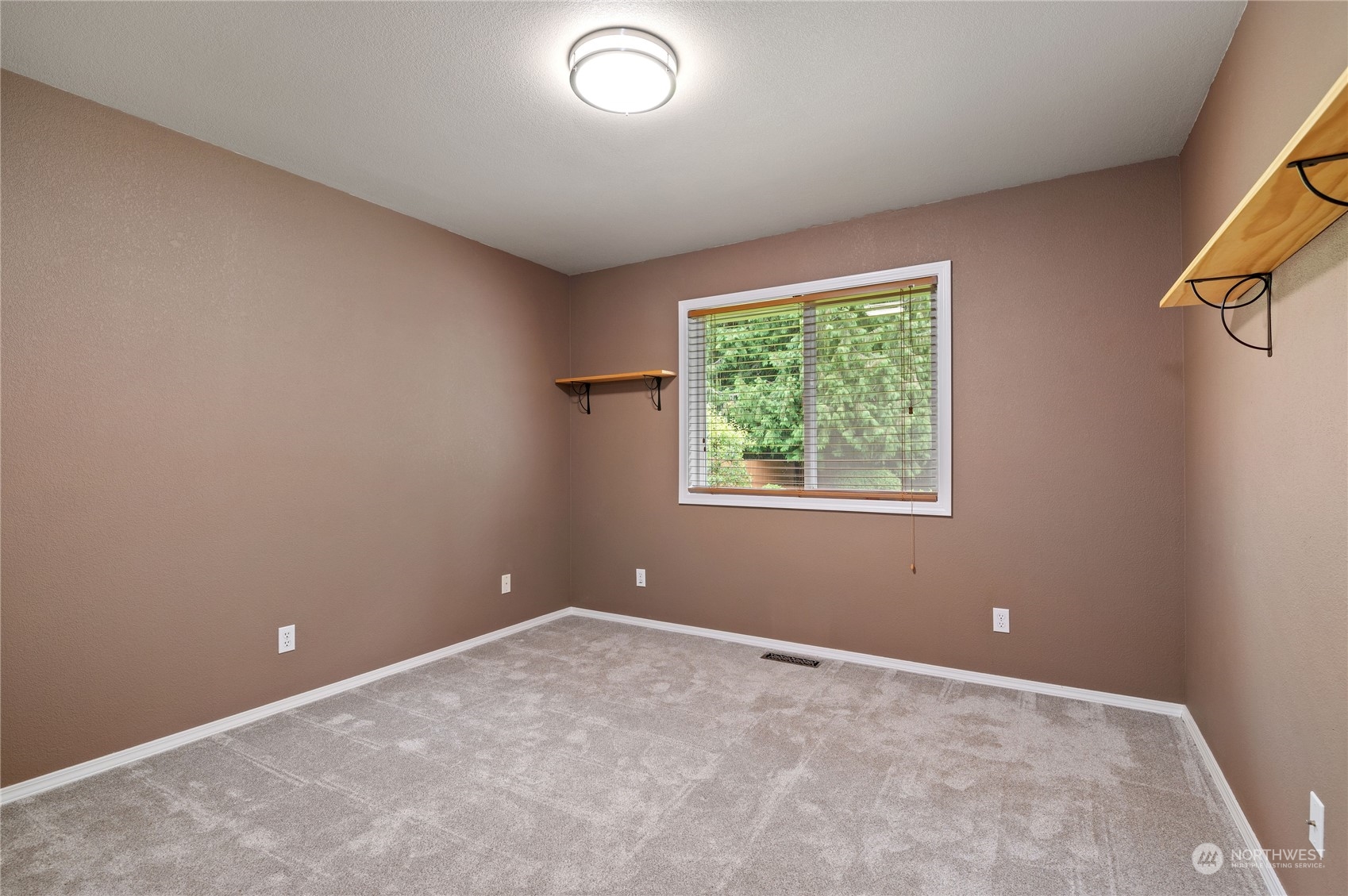 3860 Northeast Iverson Road Poulsbo, WA 98370 - Photo 26 of 40 an empty room with windows