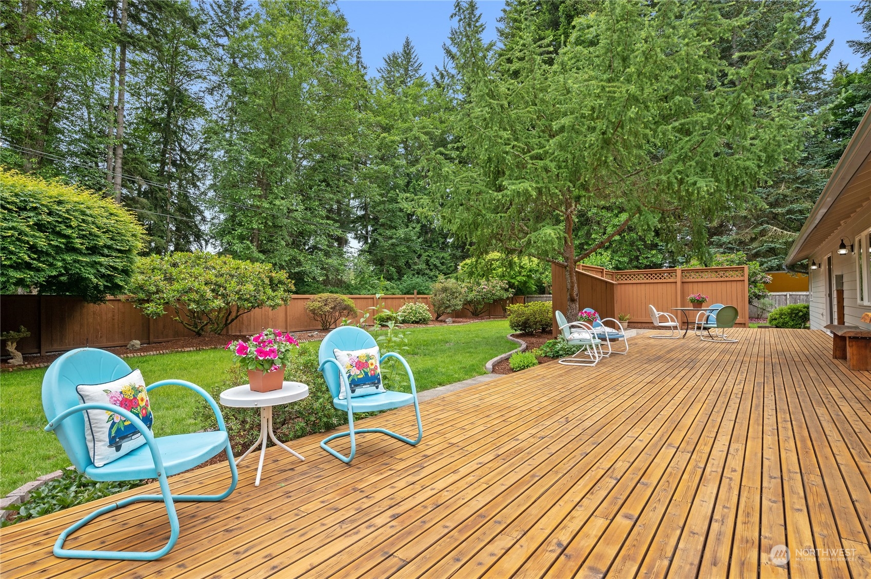 3860 Northeast Iverson Road Poulsbo, WA 98370 - Photo 27 of 40 a view of a swimming pool with a lounge chairs