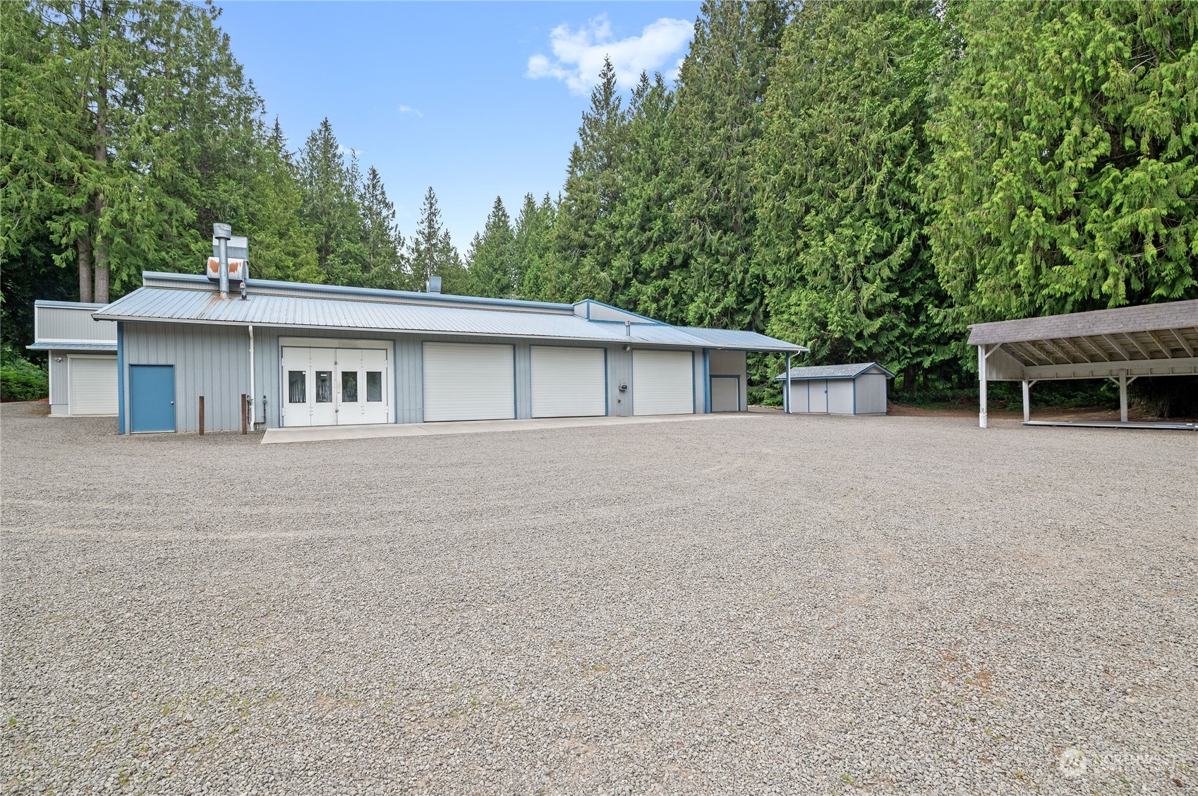 3860 Northeast Iverson Road Poulsbo, WA 98370 - Photo 37 of 40 front view of house with a yard