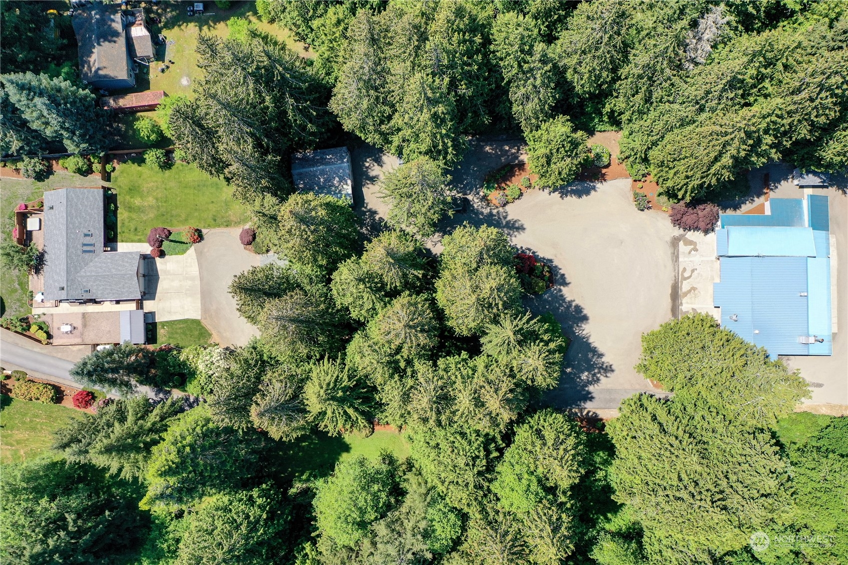 3860 Northeast Iverson Road Poulsbo, WA 98370 - Photo 40 of 40 an aerial view of a house with a yard