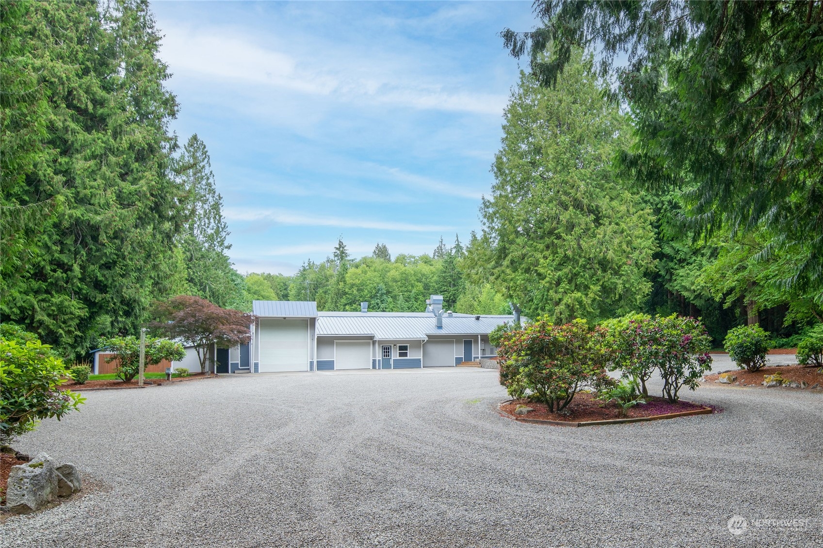 3860 Northeast Iverson Road Poulsbo, WA 98370 - Photo 4 of 40 a view of house with outdoor space and sitting area
