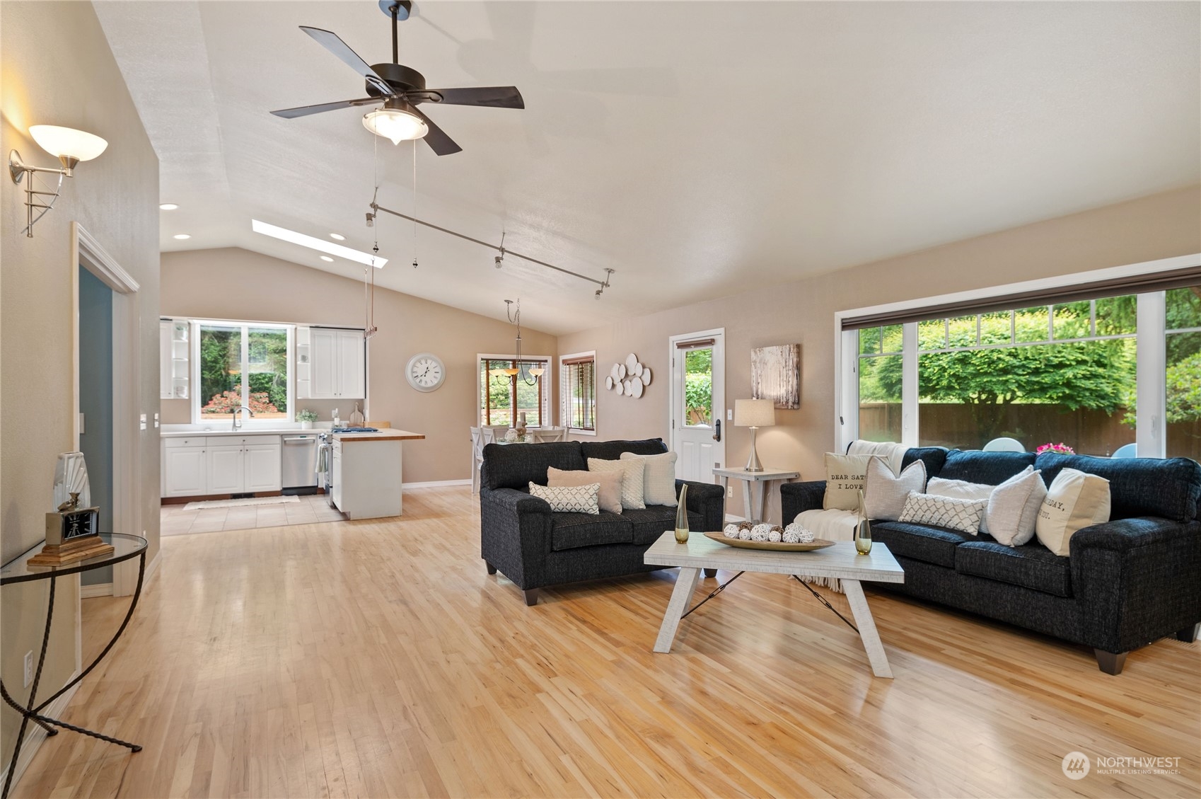 3860 Northeast Iverson Road Poulsbo, WA 98370 - Photo 10 of 40 a living room with furniture and a large window