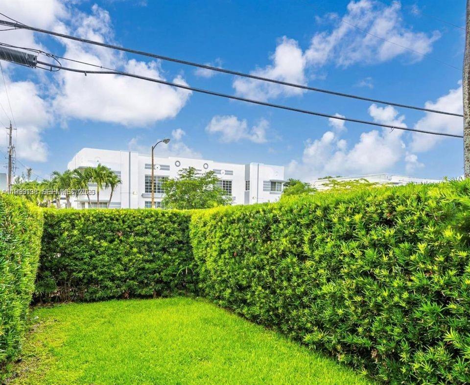 3915 Meridian Avenue, Unit 101 Miami Beach, FL 33140 - Photo 12 of 19 a view of a yard with plants