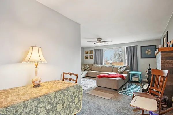 a bedroom with bed and a window