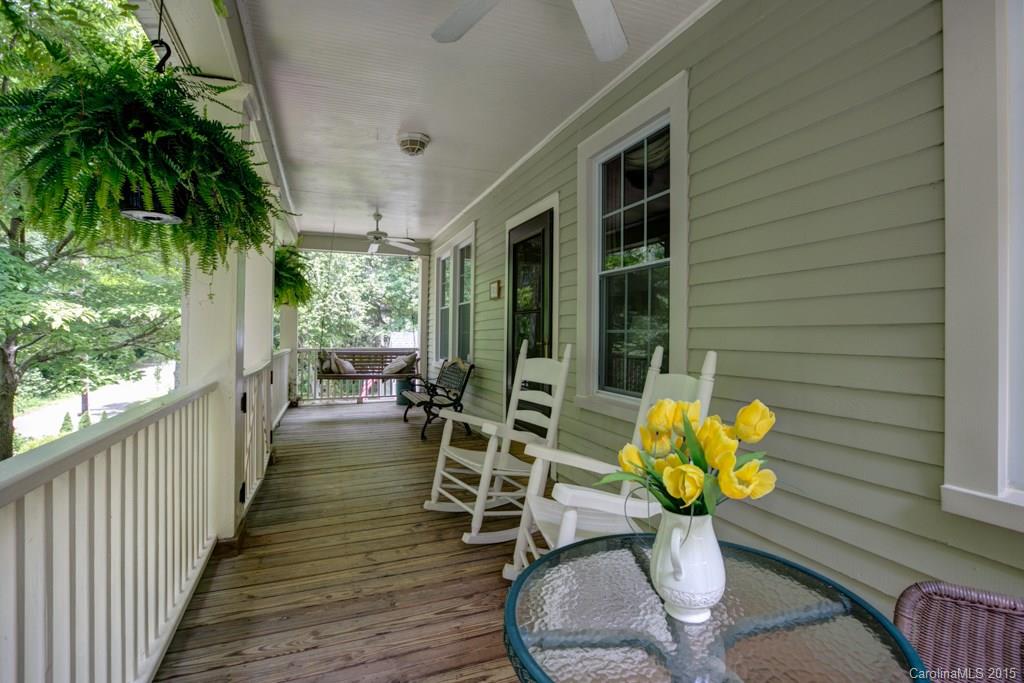 708 Ellsworth Road Charlotte, NC 28211 - Photo 5 of 24 a view of a porch with chairs