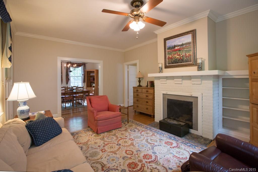 708 Ellsworth Road Charlotte, NC 28211 - Photo 7 of 24 a living room with furniture and a fireplace