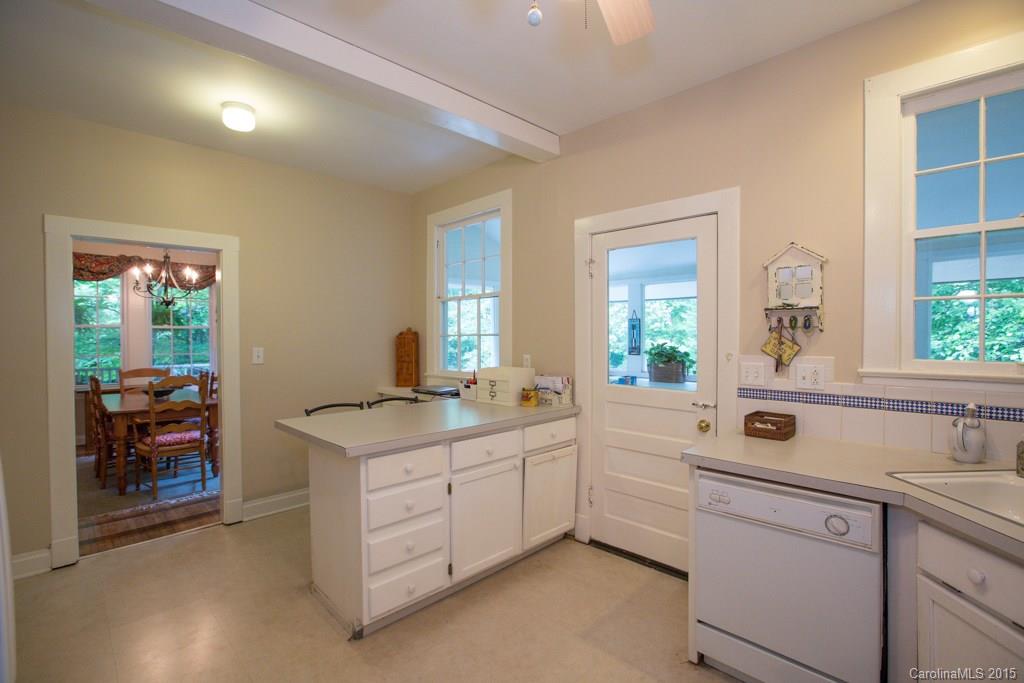 708 Ellsworth Road Charlotte, NC 28211 - Photo 9 of 24 a kitchen with a sink and cabinets