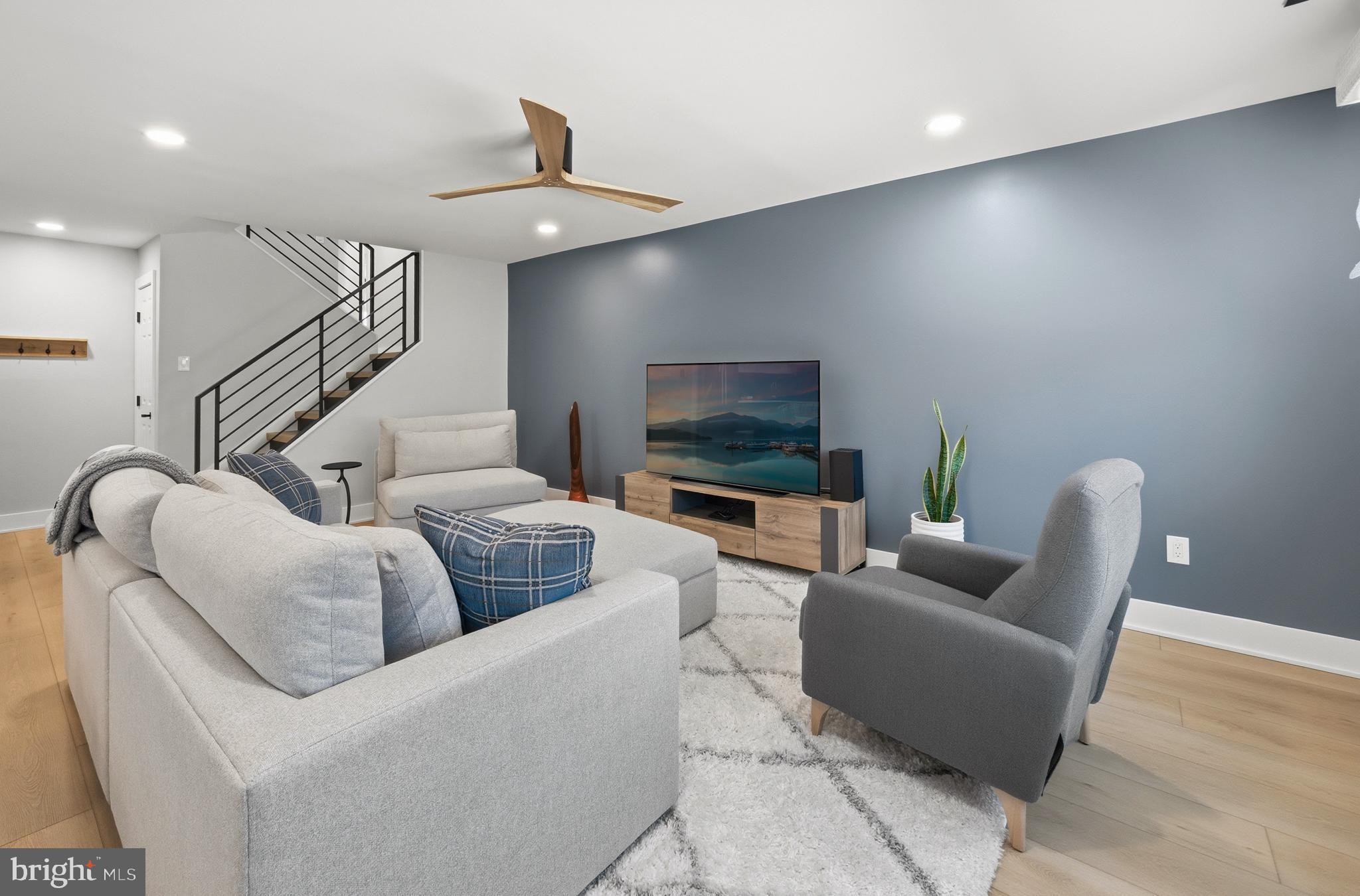 15 Haddonfield Cmns, Unit 15 Haddonfield, NJ 08033 - Photo 12 of 48 a living room with furniture and a flat screen tv