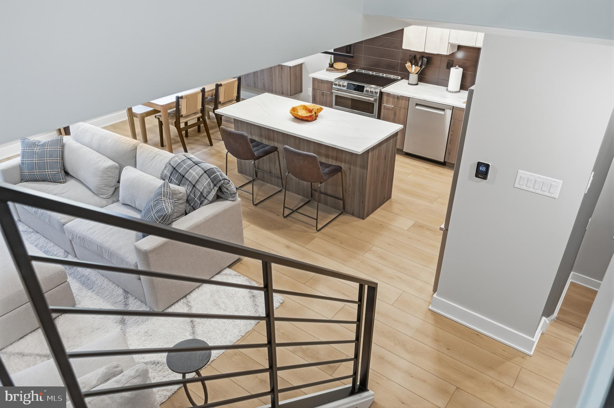 15 Haddonfield Cmns, Unit 15 Haddonfield, NJ 08033 - Photo 14 of 48 a workspace with furniture and wooden floor