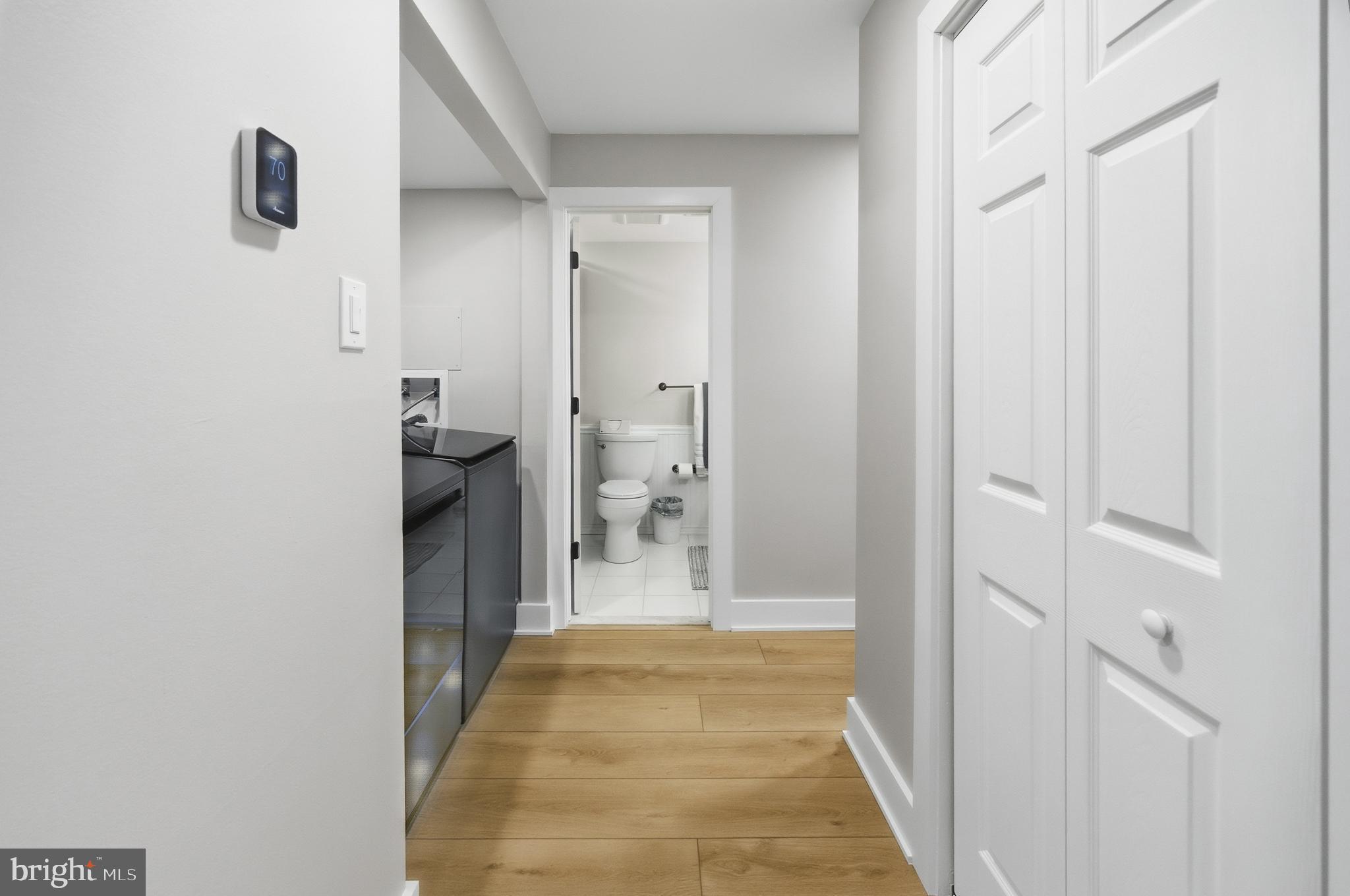 15 Haddonfield Cmns, Unit 15 Haddonfield, NJ 08033 - Photo 23 of 48 a view of a bathroom from a hallway