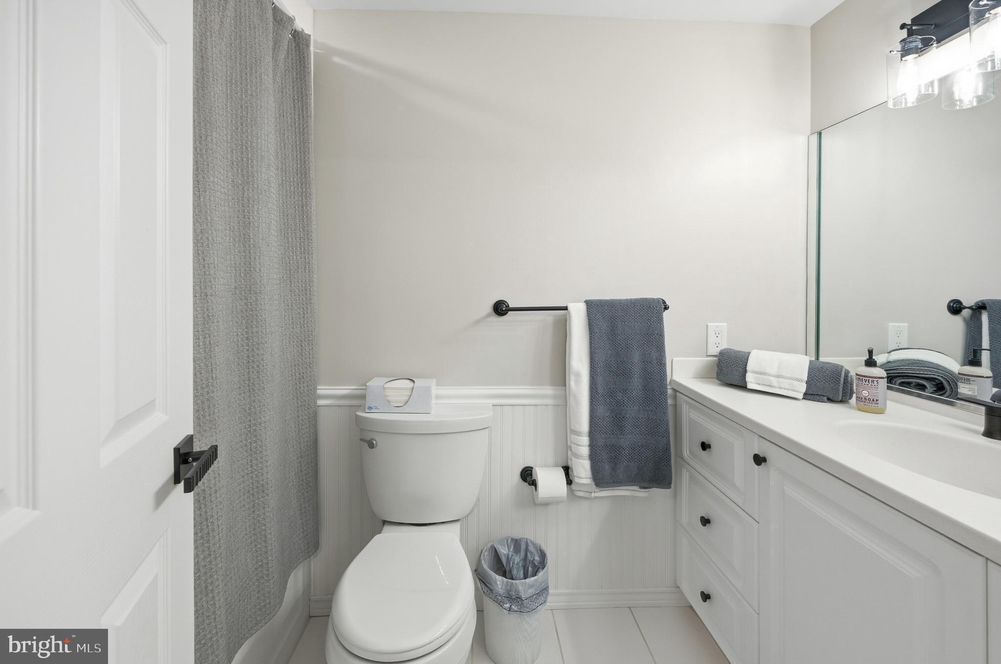 15 Haddonfield Cmns, Unit 15 Haddonfield, NJ 08033 - Photo 25 of 48 a white toilet sitting next to a bathroom sink