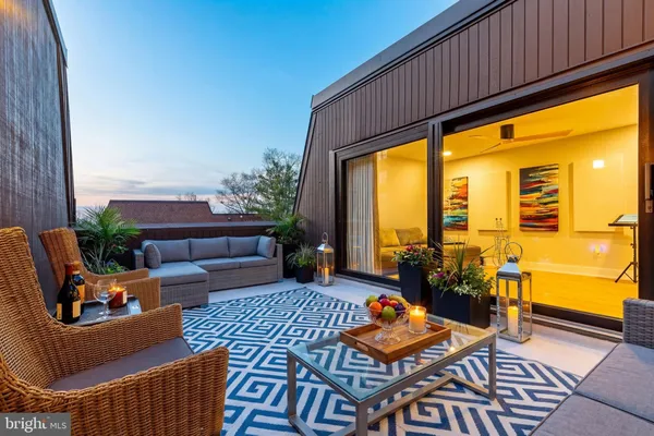 a outdoor living space with furniture and garden view