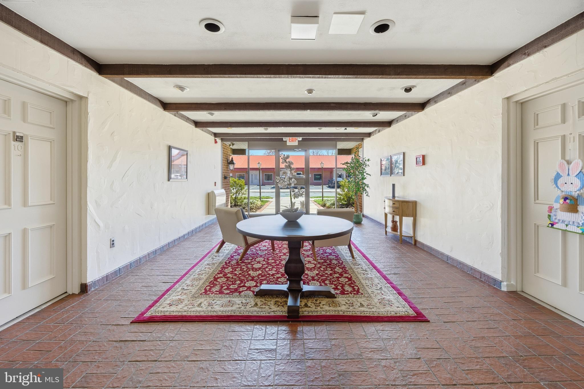 15 Haddonfield Cmns, Unit 15 Haddonfield, NJ 08033 - Photo 39 of 48 a living room with a rug