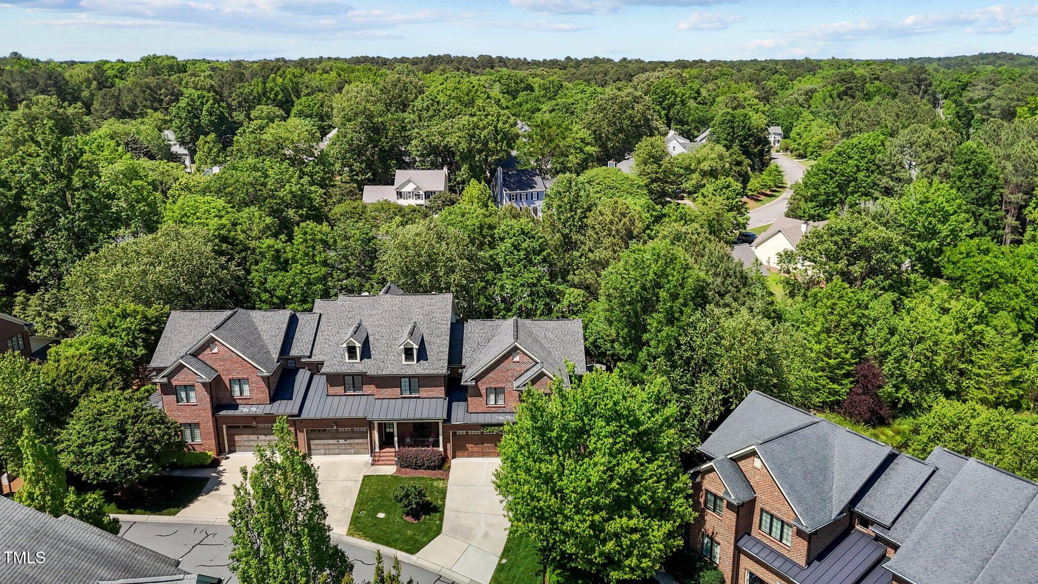 145 Cofield Circle Durham, NC 27707 - Photo 50 of 53 an aerial view of a house with garden space and street view