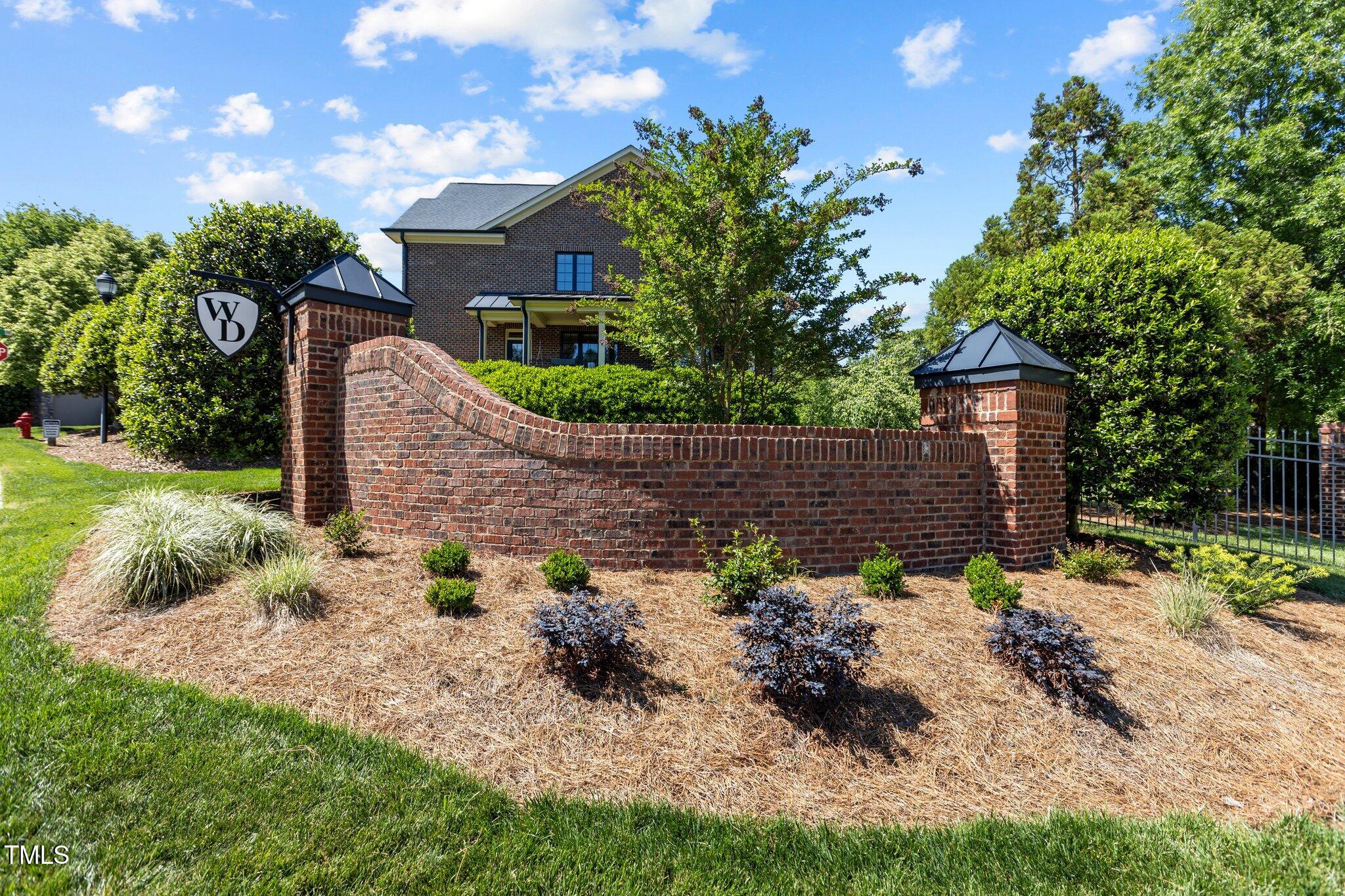 145 Cofield Circle Durham, NC 27707 - Photo 52 of 53 a front view of a house with a yard