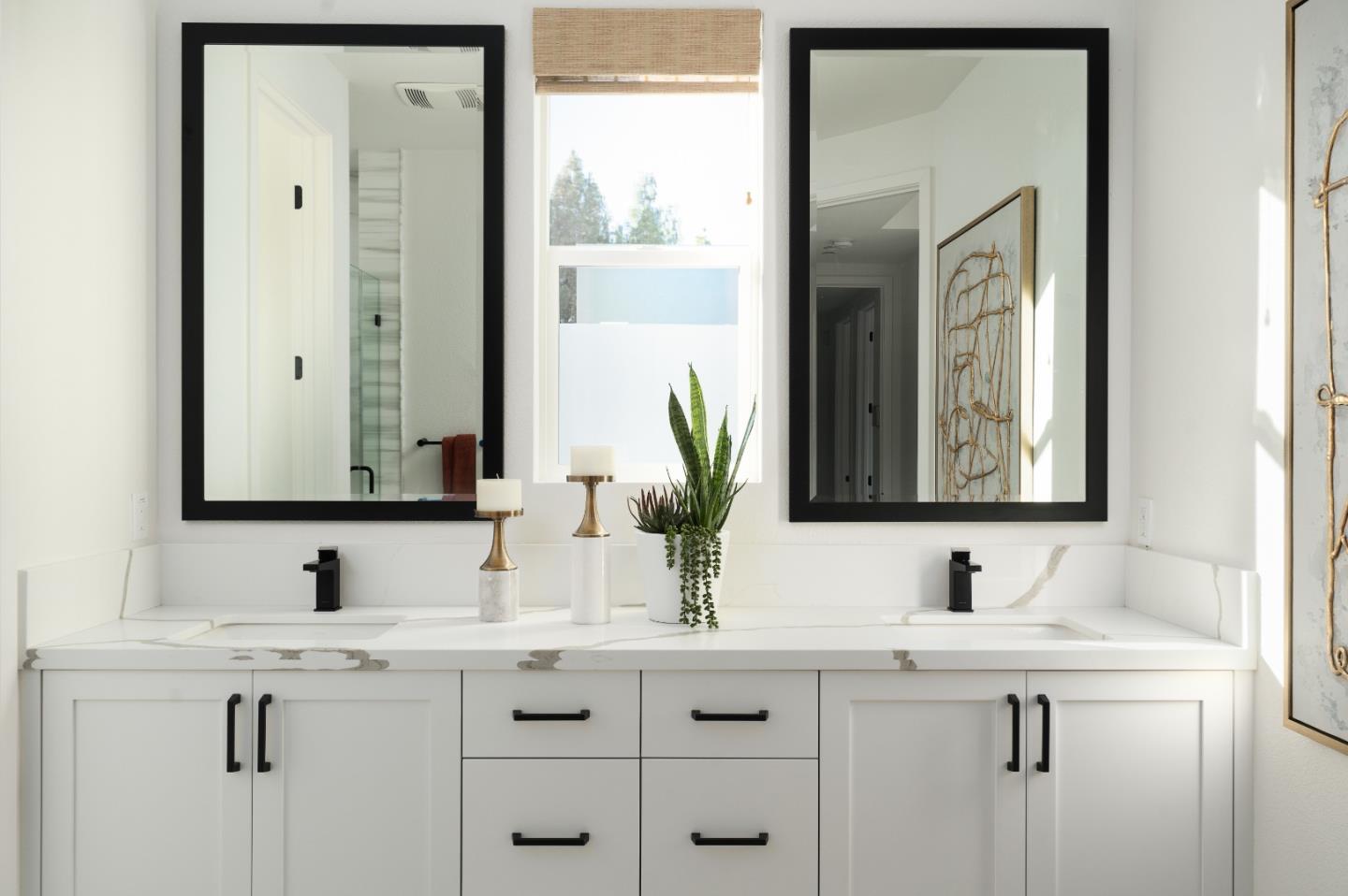 321 Isabelline Court San Ramon, CA 94583 - Photo 13 of 14 a bathroom with double sink and a mirror