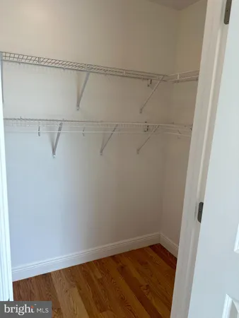 a view of a room with racks on the wall