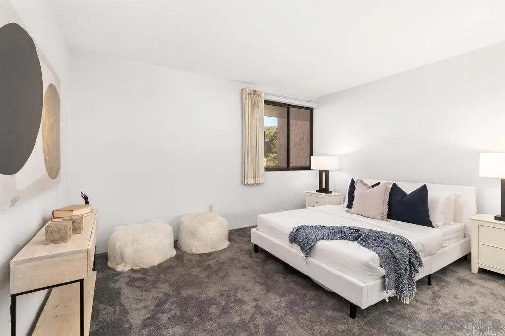 2500 Torrey Pines Road, Unit 402 La Jolla, CA 92037 - Photo 15 of 21 a bedroom with a bed and a window
