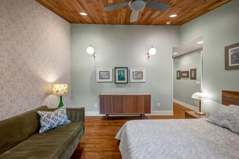 a view of a living room and bathroom