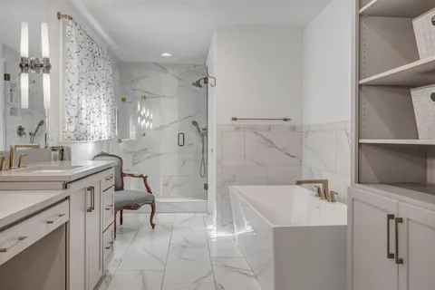 a living room with furniture large window and wooden floor