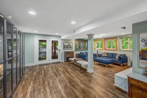 a kitchen with stainless steel appliances a stove and cabinets