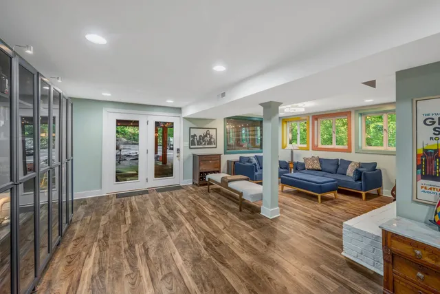 a kitchen with stainless steel appliances a stove and cabinets