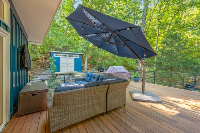 a view of balcony and yard