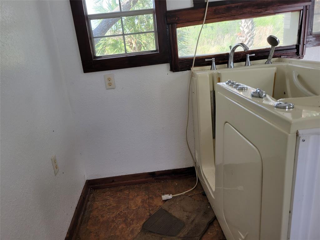 3759 Southwest 6th Avenue Okeechobee, FL 34974 - Photo 27 of 27 a view of storage and utility room with a window