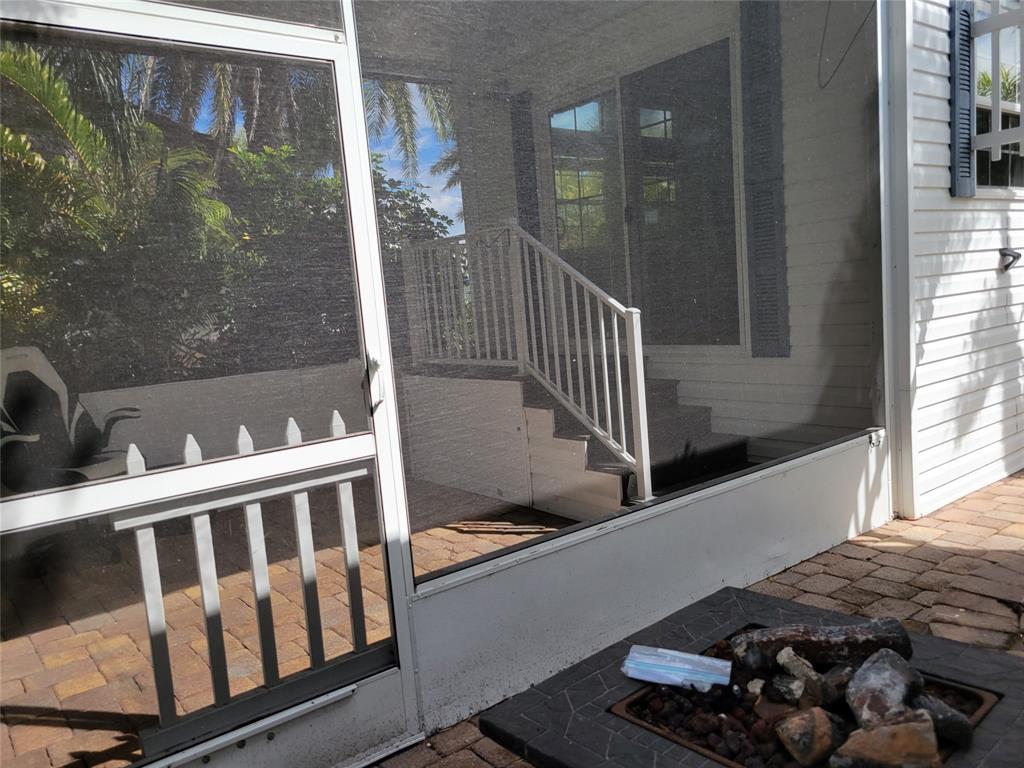 3759 Southwest 6th Avenue Okeechobee, FL 34974 - Photo 3 of 27 a view of a porch with furniture