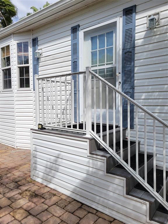 3759 Southwest 6th Avenue Okeechobee, FL 34974 - Photo 6 of 27 a view of balcony with wooden floor and fence