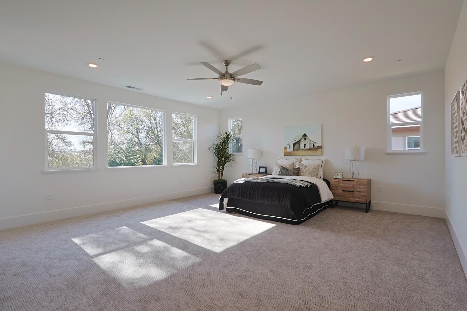 5638 Lakepointe Drive Rocklin, CA 95677 - Photo 11 of 30 a bedroom with a bed and window